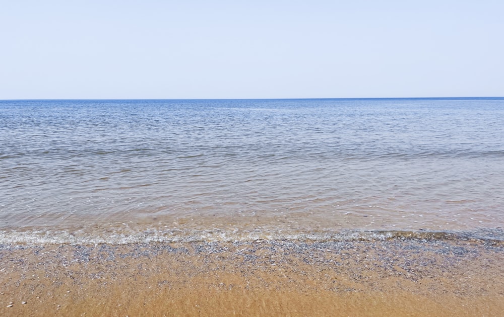 a view of the ocean from a beach