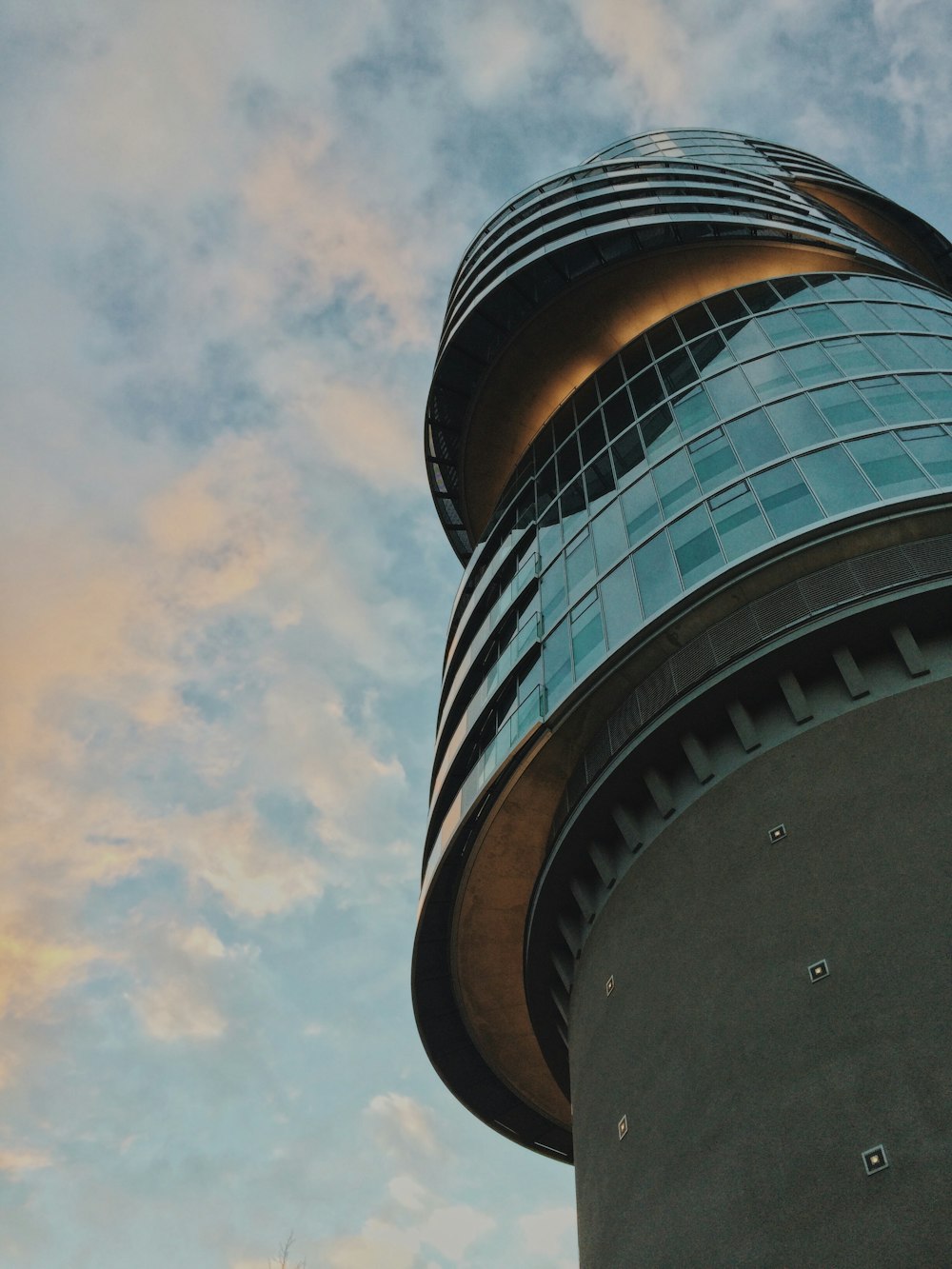 a tall tower with a sky background