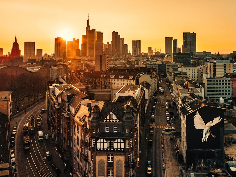 a city skyline with a train on the tracks