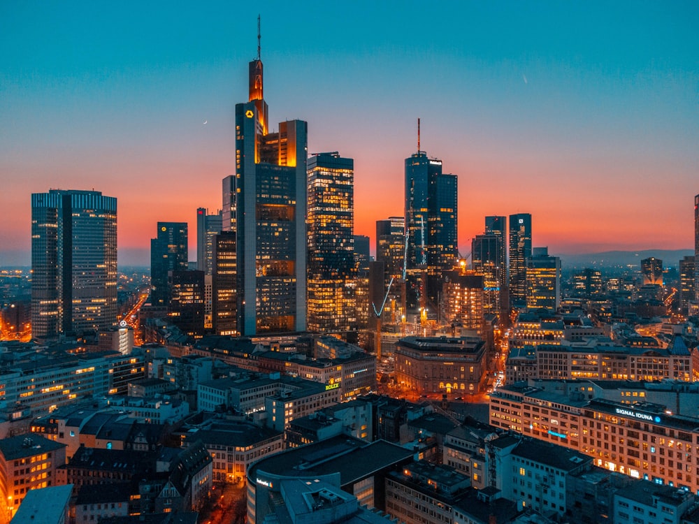 a view of a city at night from the top of a building