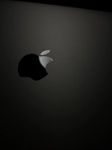A sleek, modern website interface inspired by Apple design aesthetics.