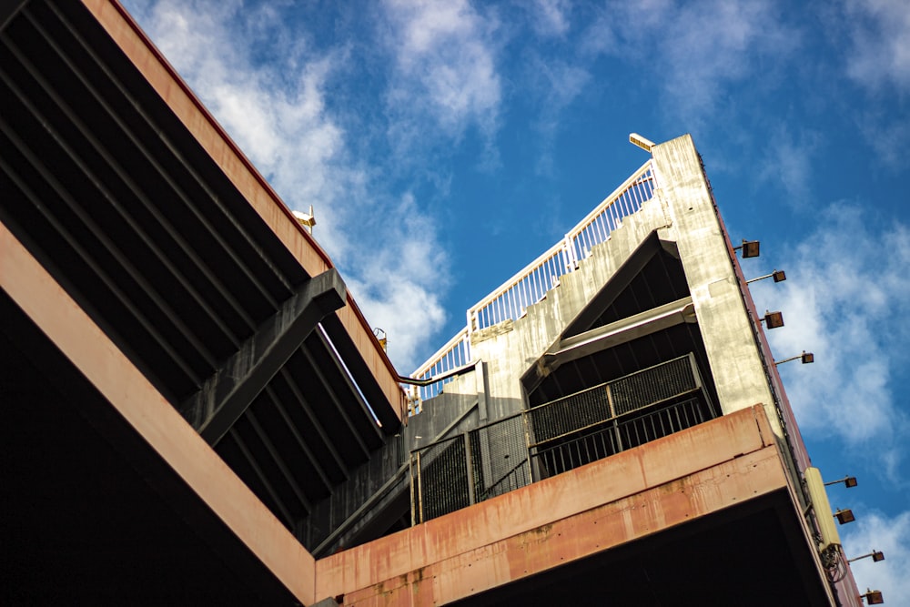 a view of the top of a bridge from below