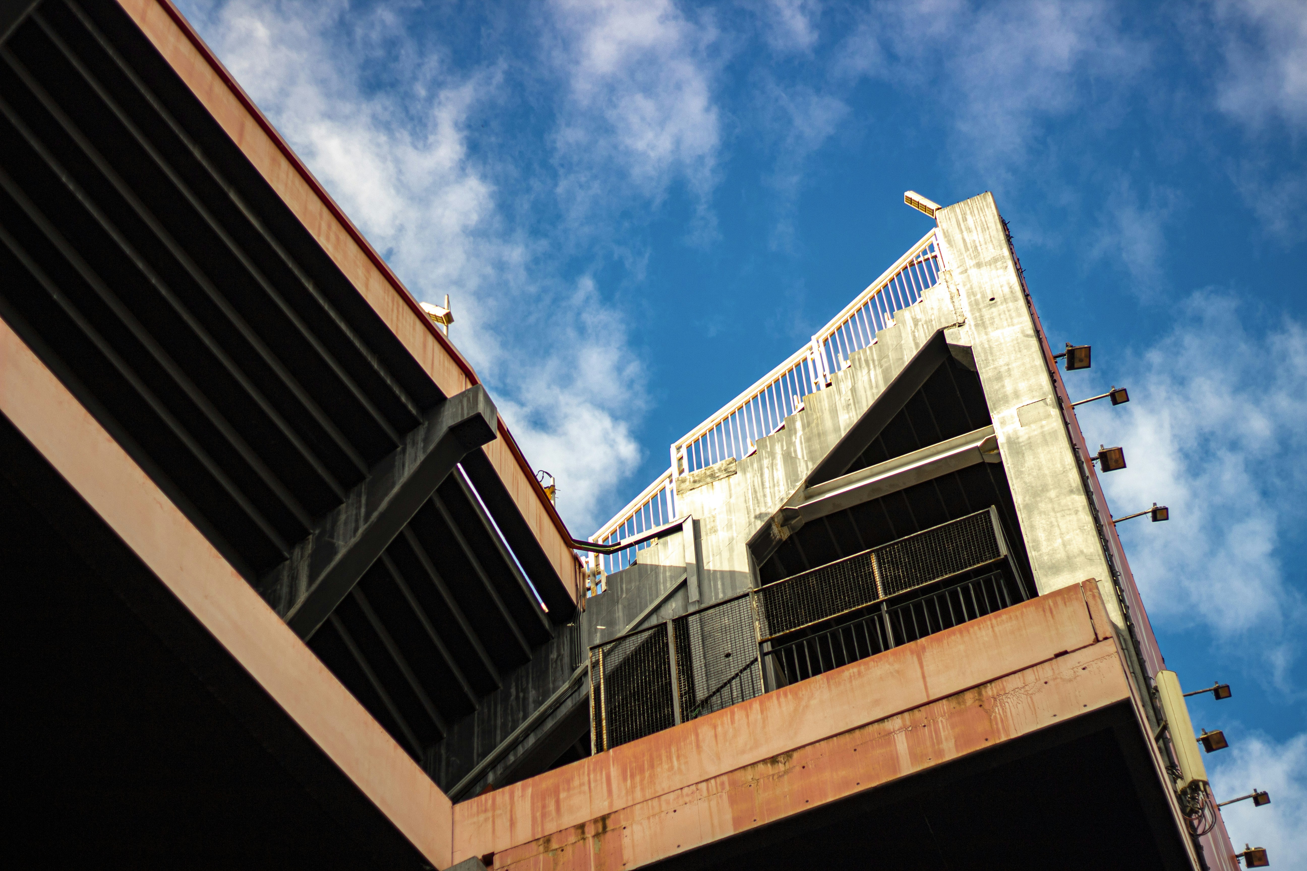 a view of the top of a bridge from below