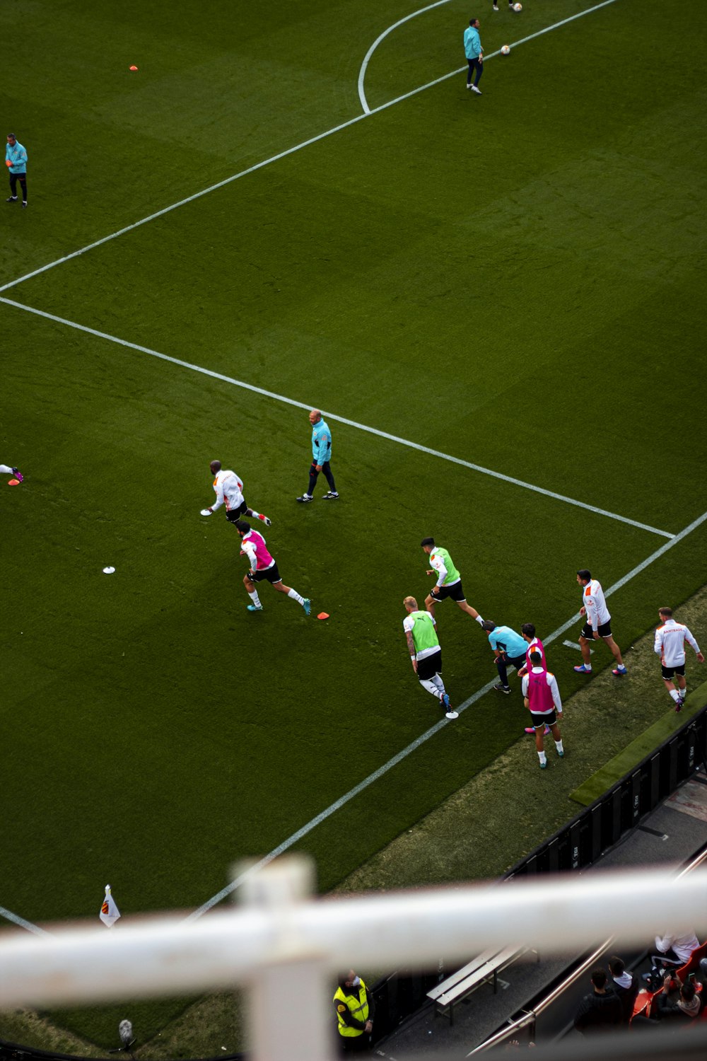 a group of people on a field playing soccer