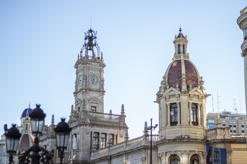 a large building with a clock on the top of it