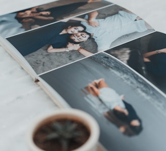 a photo book with four photos of people laying down