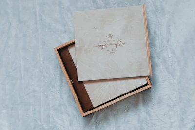 two wooden boxes sitting on top of a table