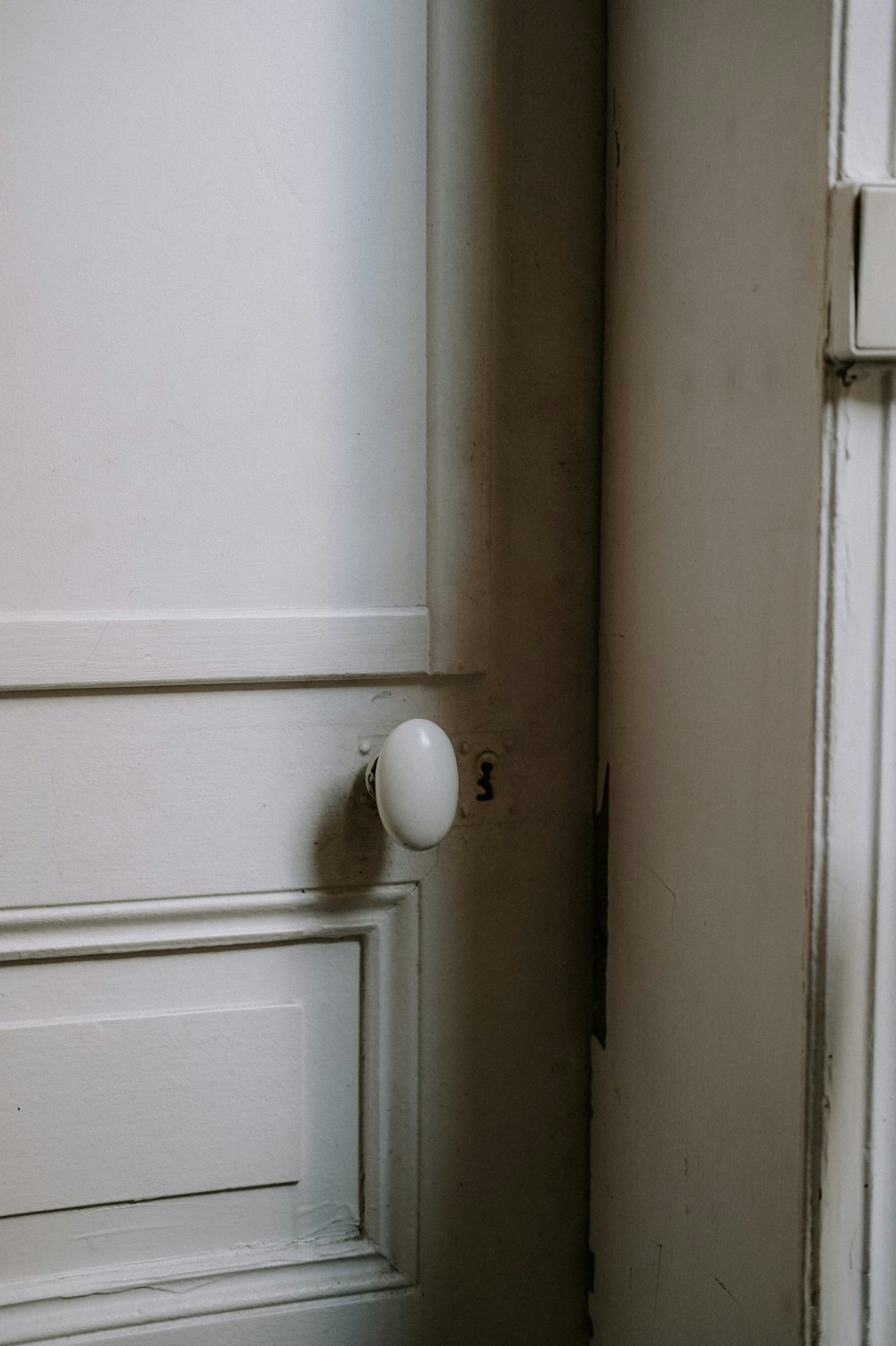 a white door with a white knob on it