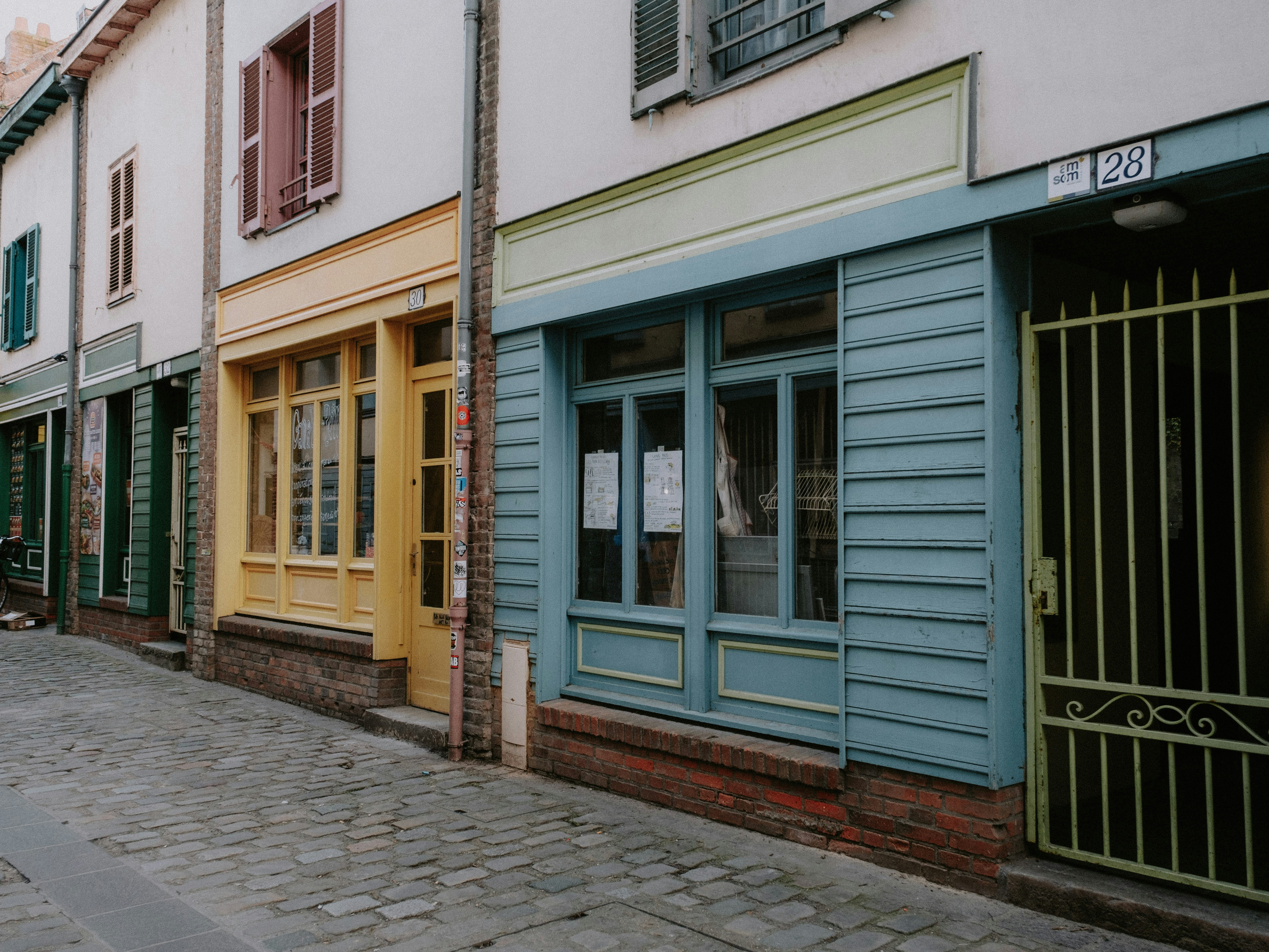 a row of buildings on a city street