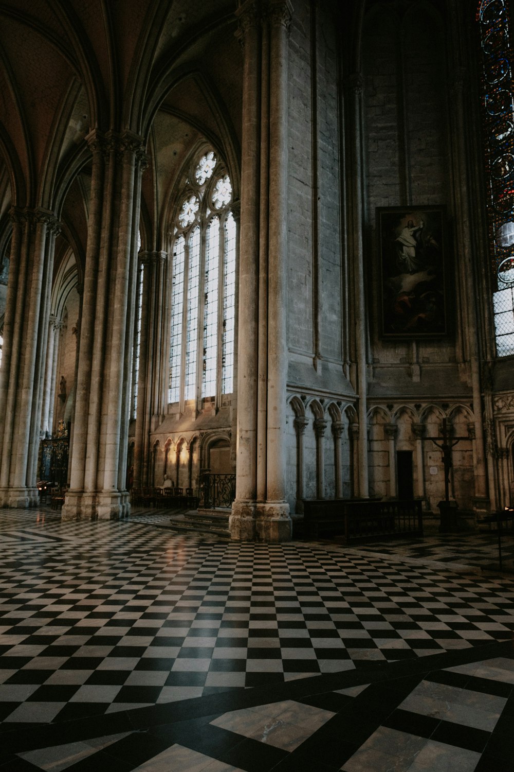 a black and white checkered floor in a cathedral