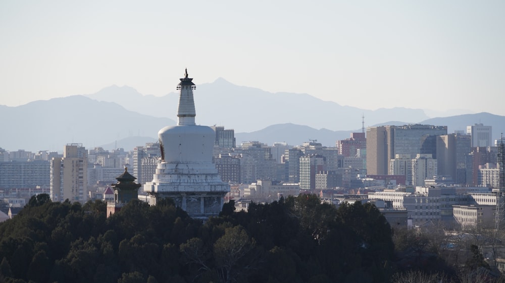 a view of a city with mountains in the background