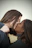 a couple of women that are kissing each other