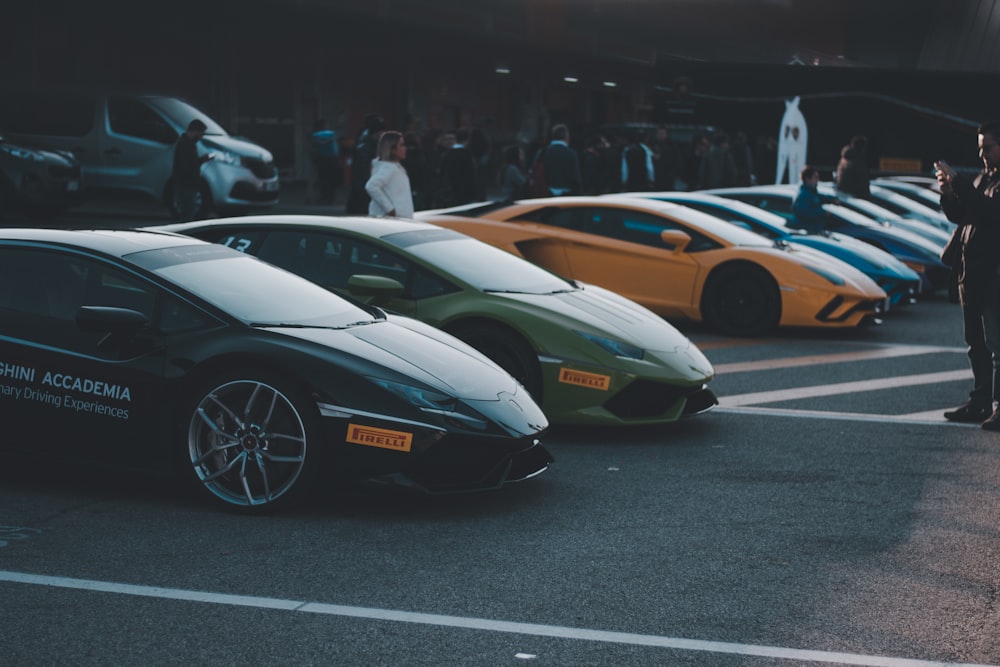 a group of cars parked next to each other in a parking lot