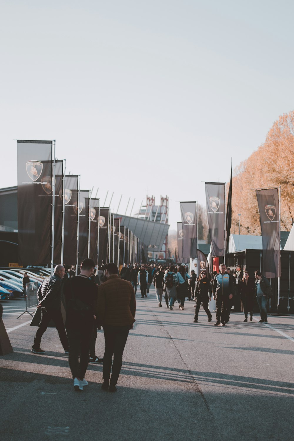 a group of people walking down a street