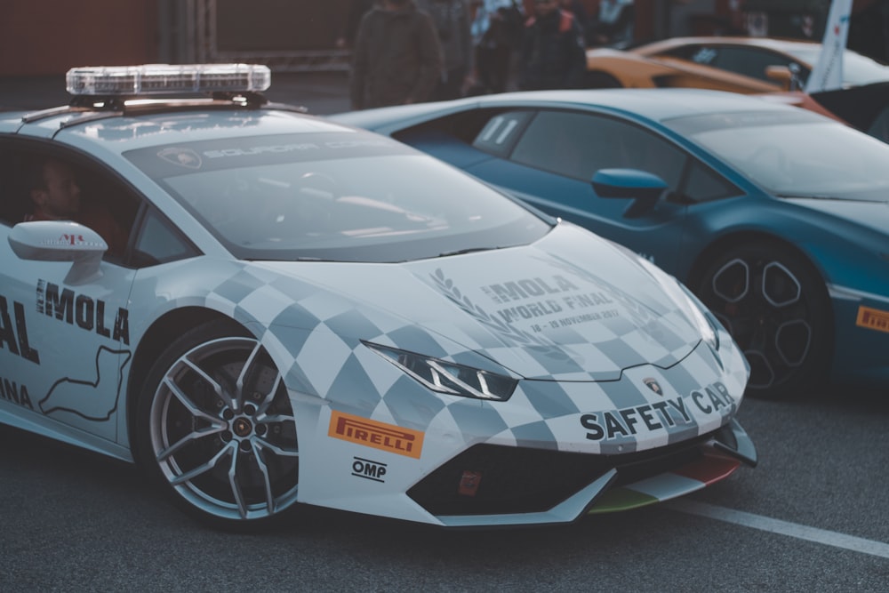 a white car with a checkered design on it