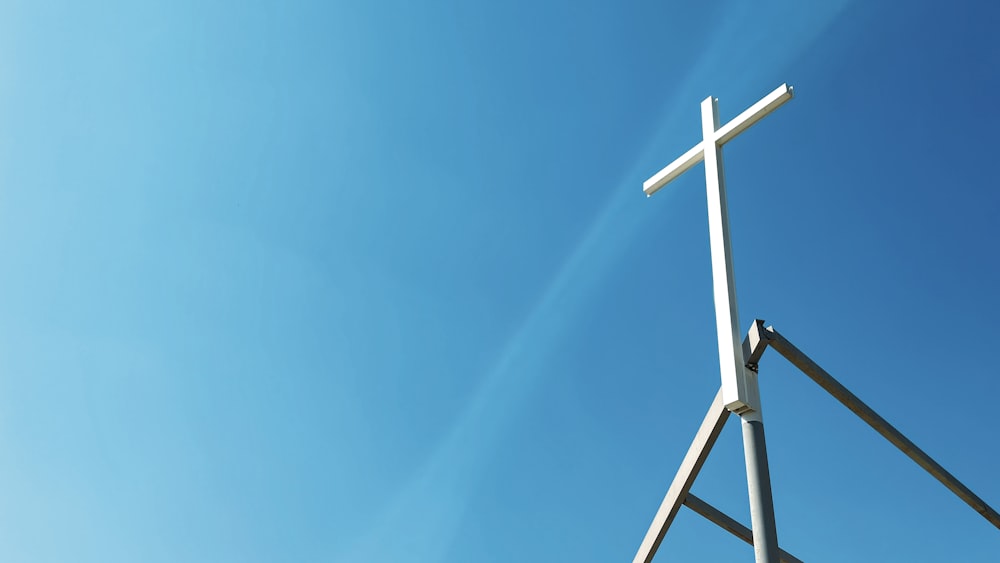 a cross on top of a metal structure