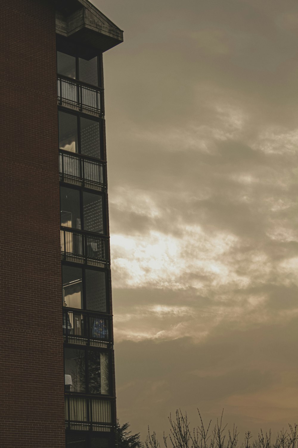 a tall building with a clock on the side of it