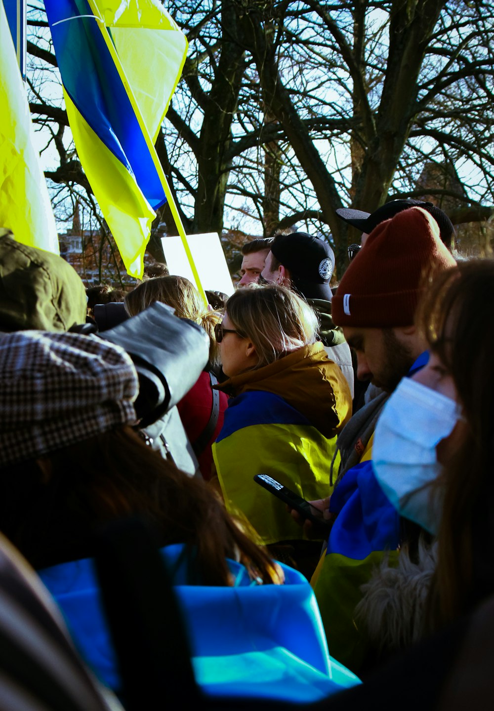 a group of people sitting at a kite