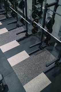 a gym with a black and white checkered floor