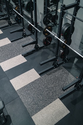 a gym with a black and white checkered floor