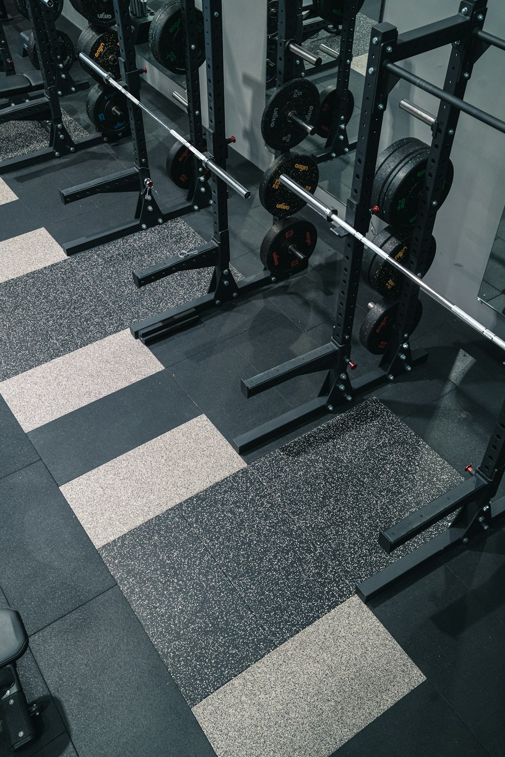 a gym with a black and white checkered floor