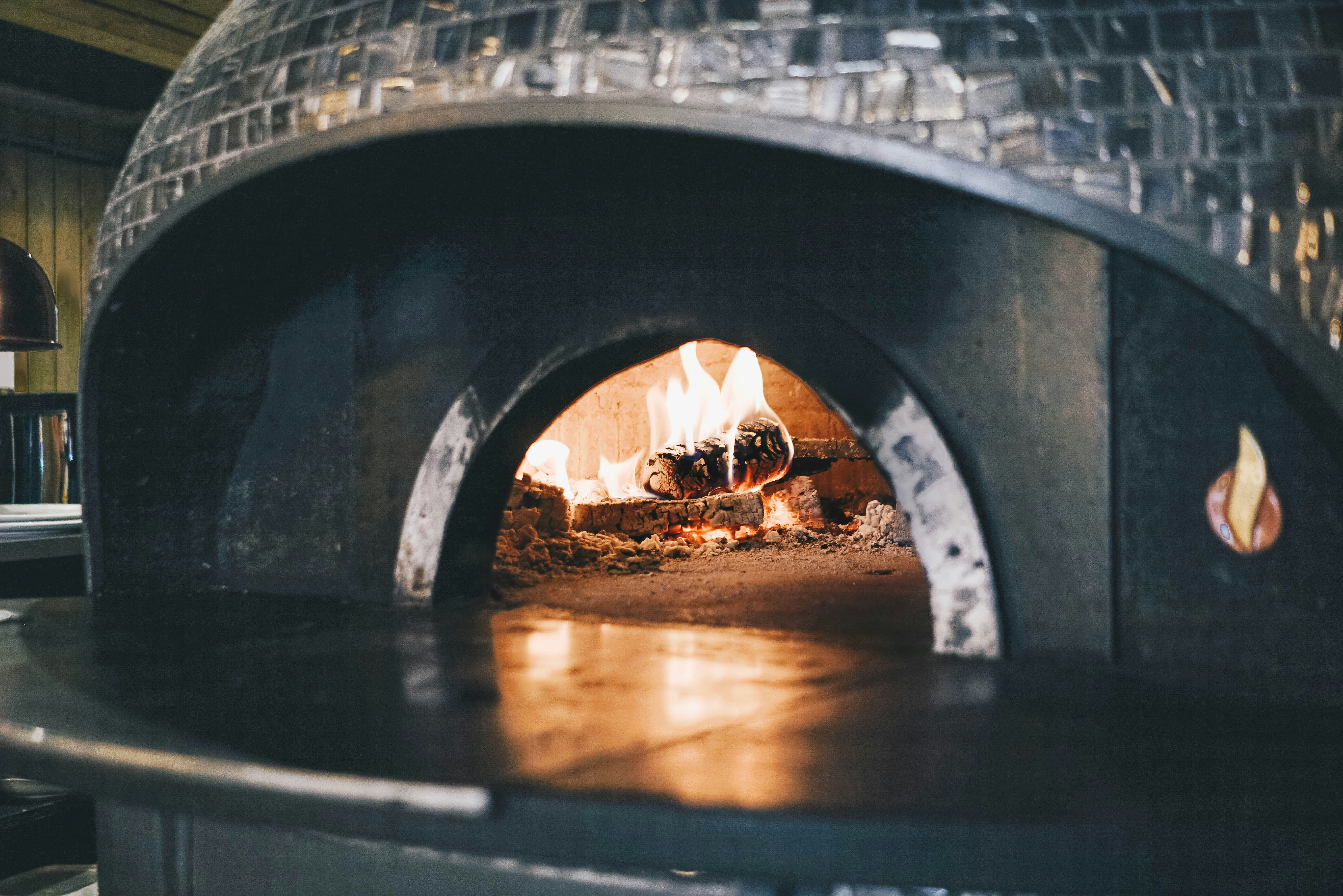 Wood-fired oven with fire