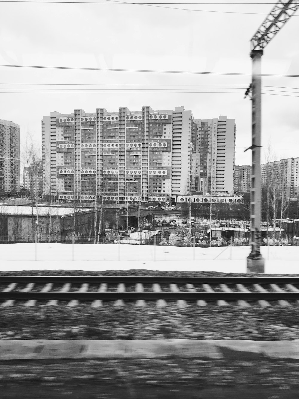 a black and white photo of a train track