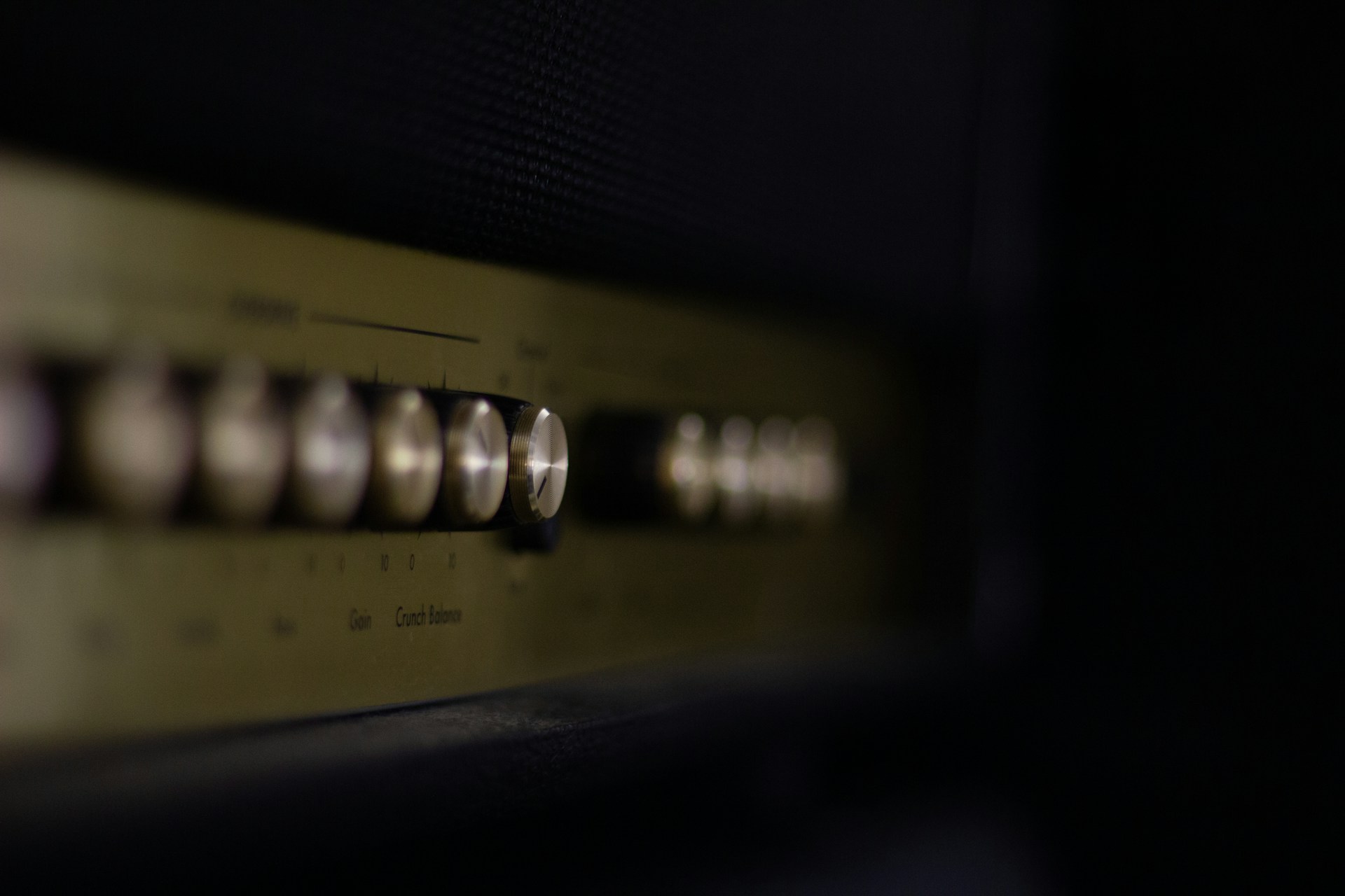 a close up of the knobs on a stove