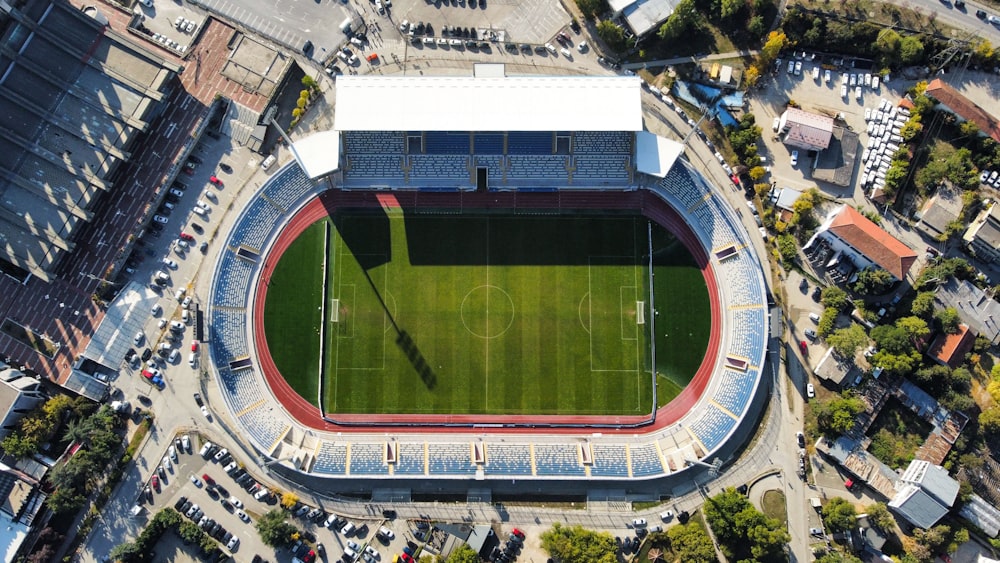 an aerial view of a soccer field in a city