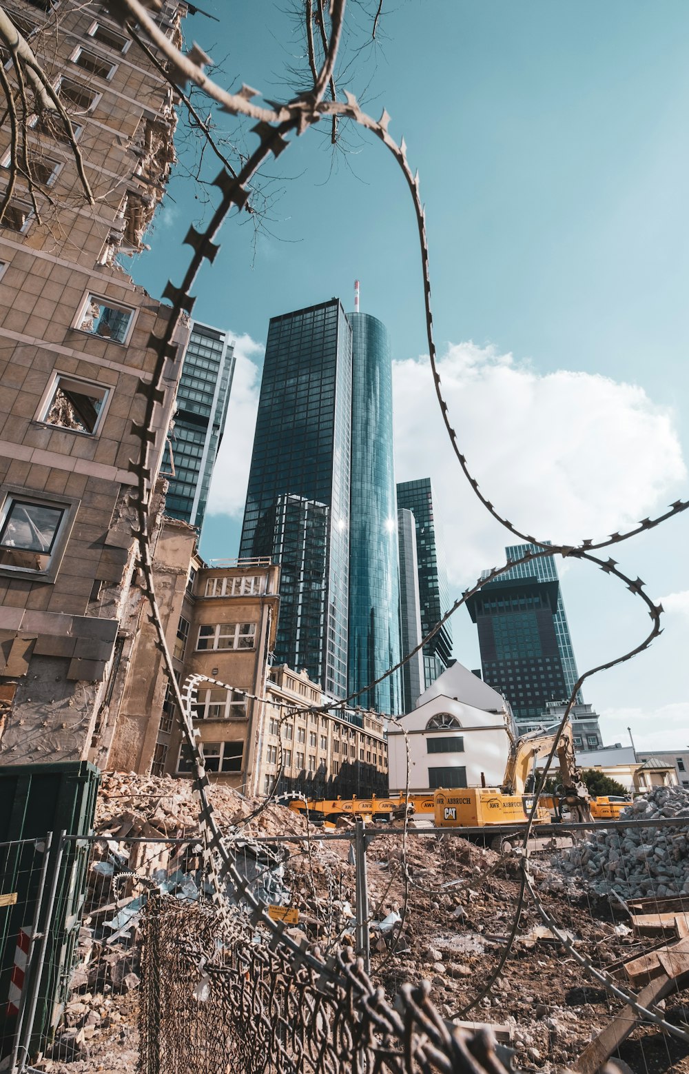 a building that is next to a bunch of barbed wire