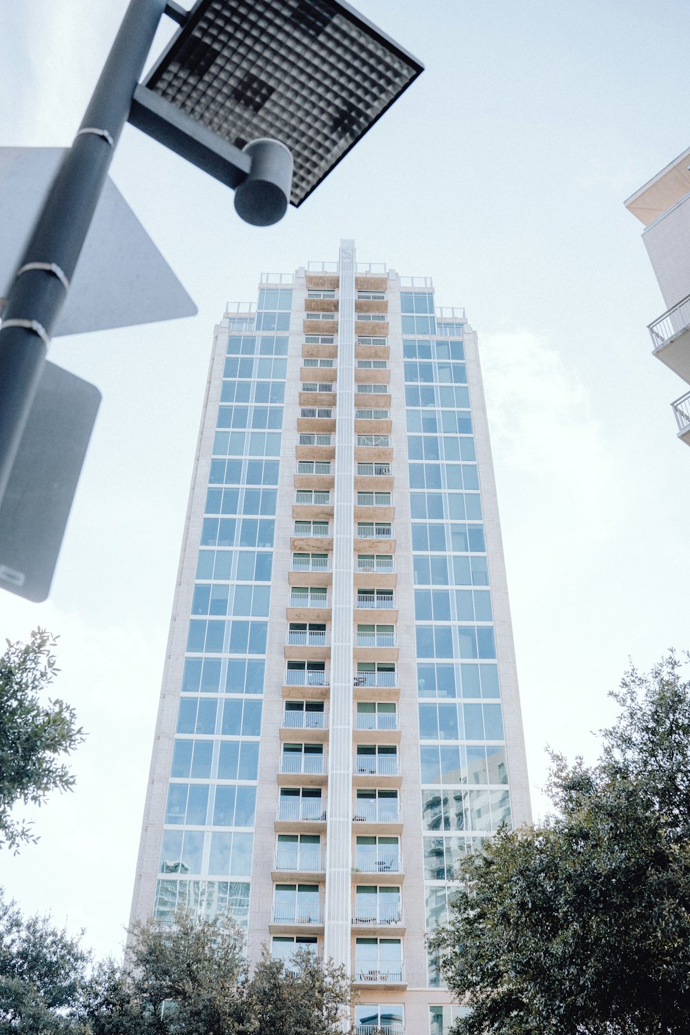 a tall building sitting next to a traffic light