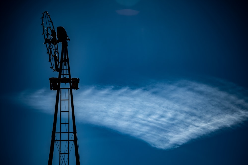 a tall tower with a sky in the background