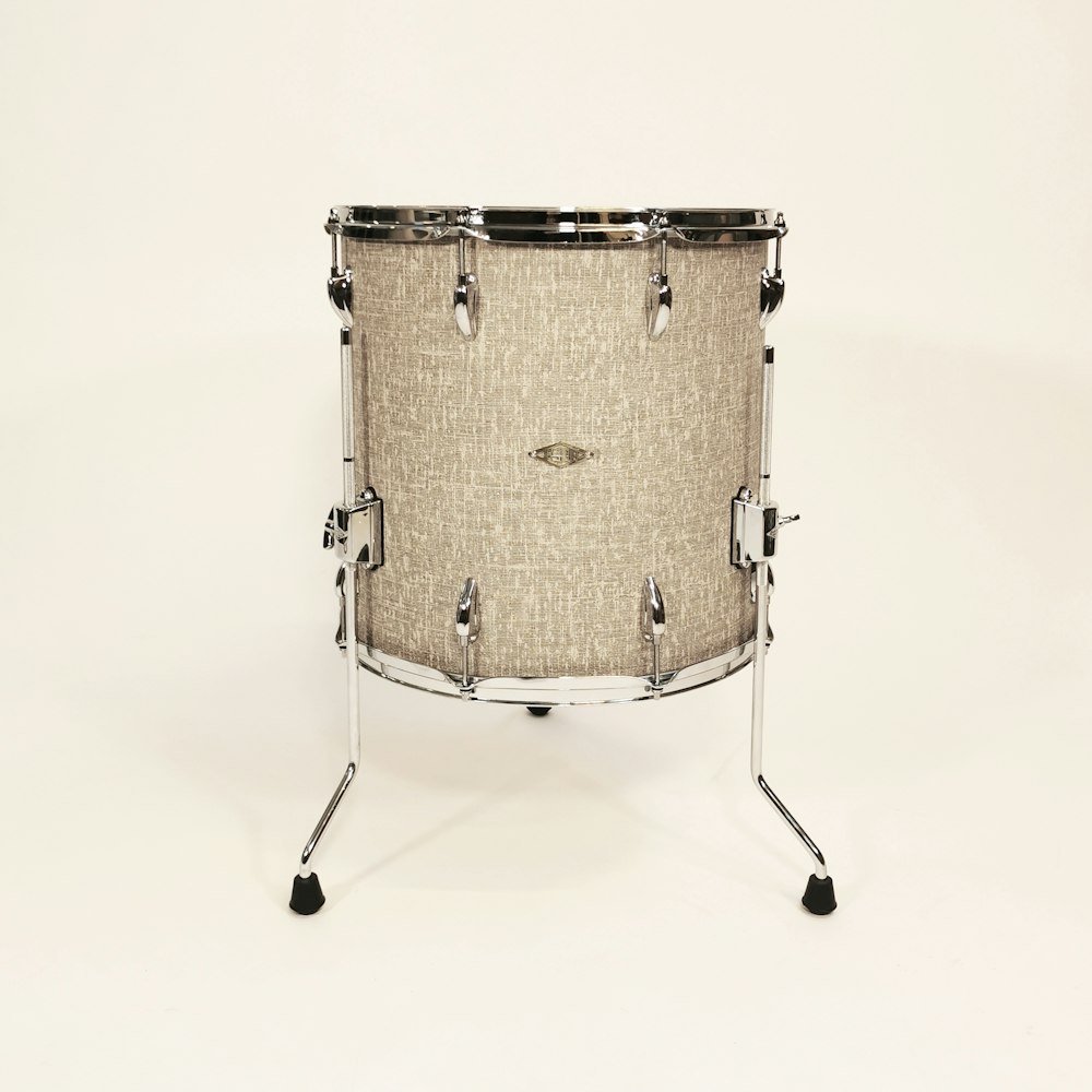 a close up of a drum on a white background