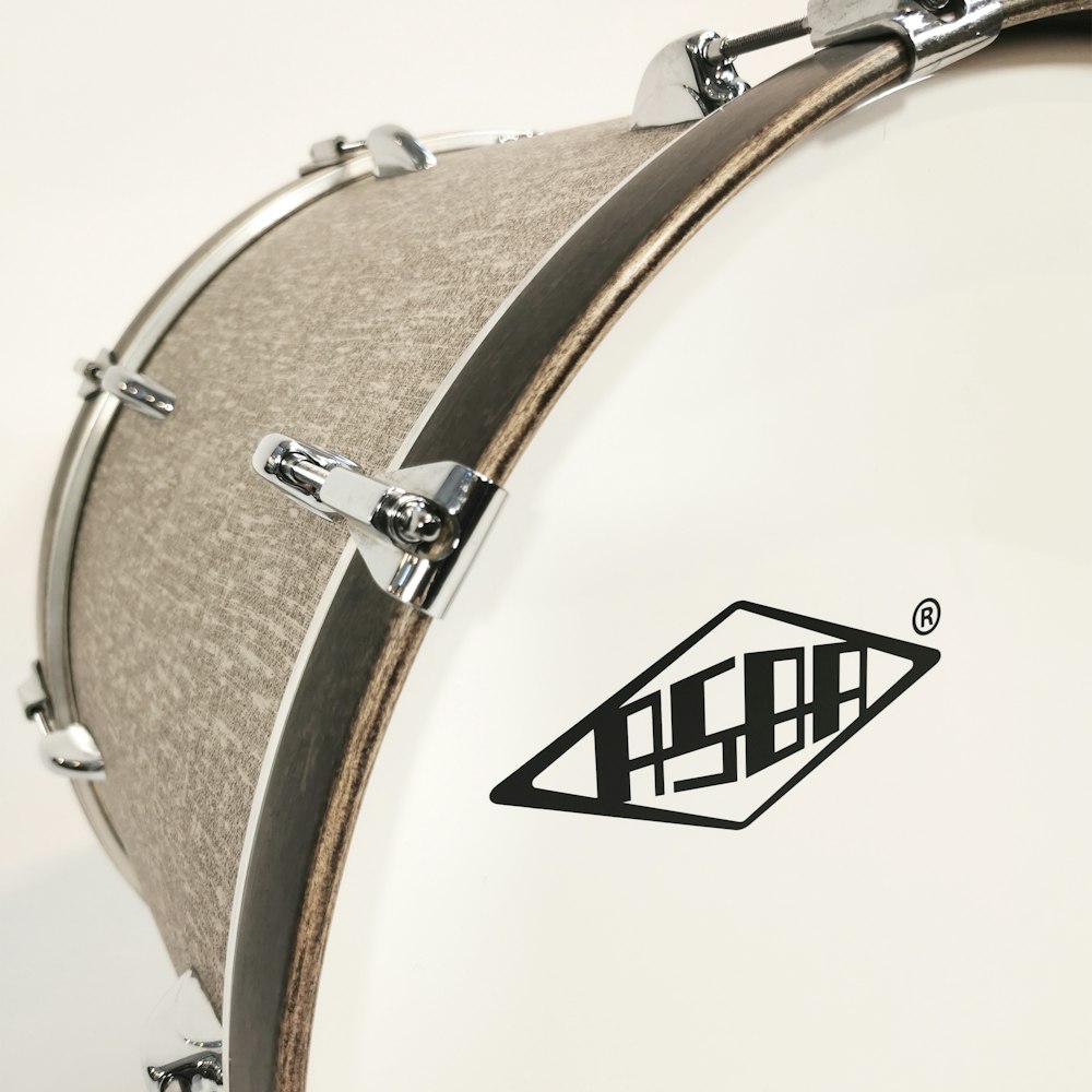 a close up of a drum head on a white background