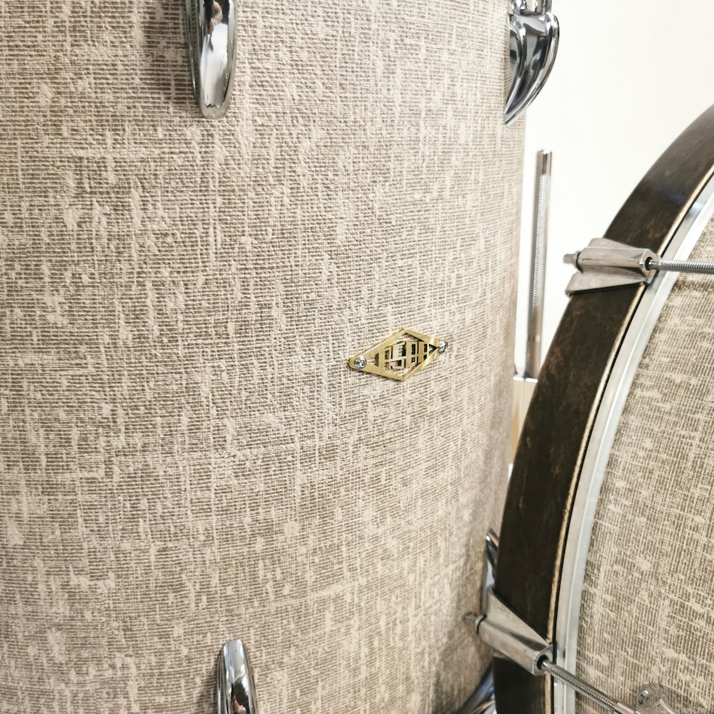 a close up of a drum on a white background