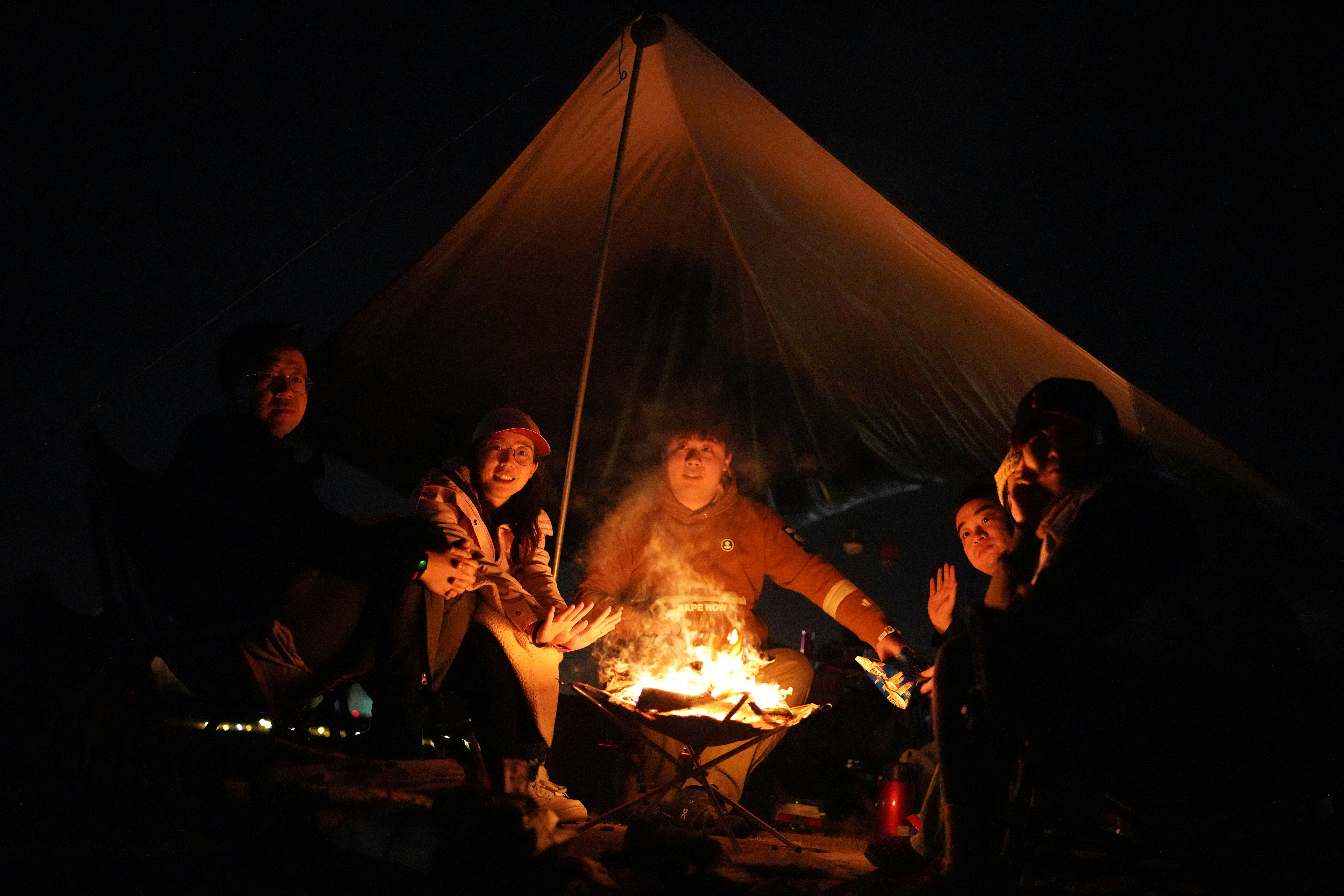 Group around campfire