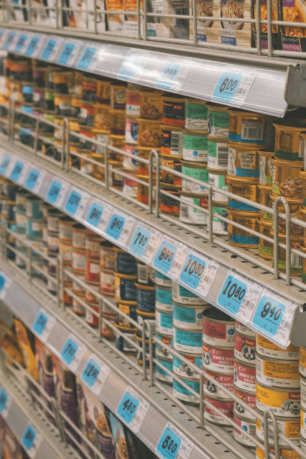 a shelf in a store filled with lots of food