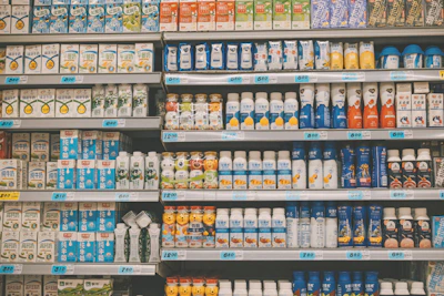 a display in a grocery store filled with lots of milk