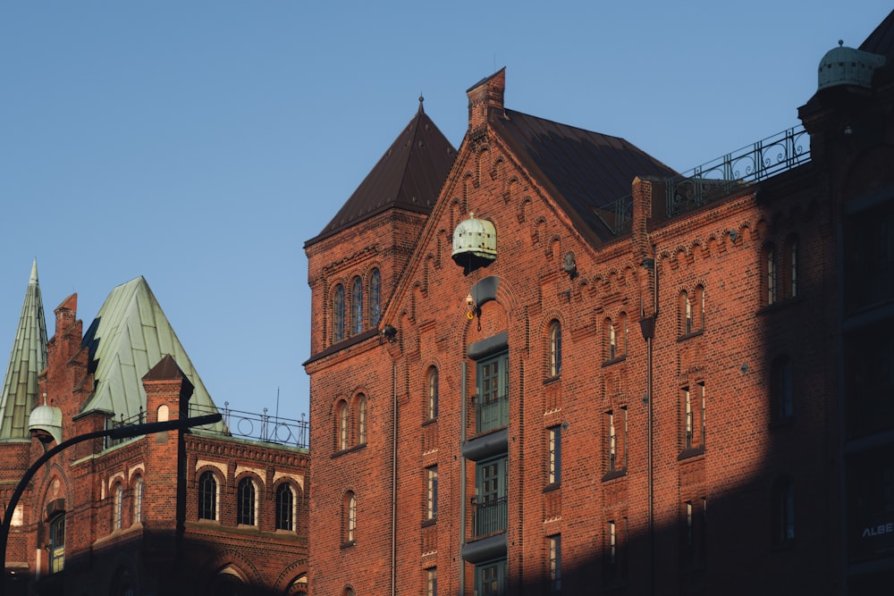 a large brick building with a clock on it's face