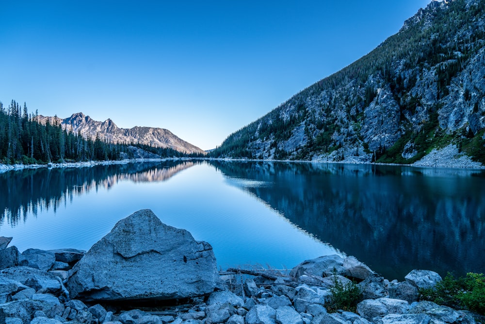 a large body of water surrounded by mountains