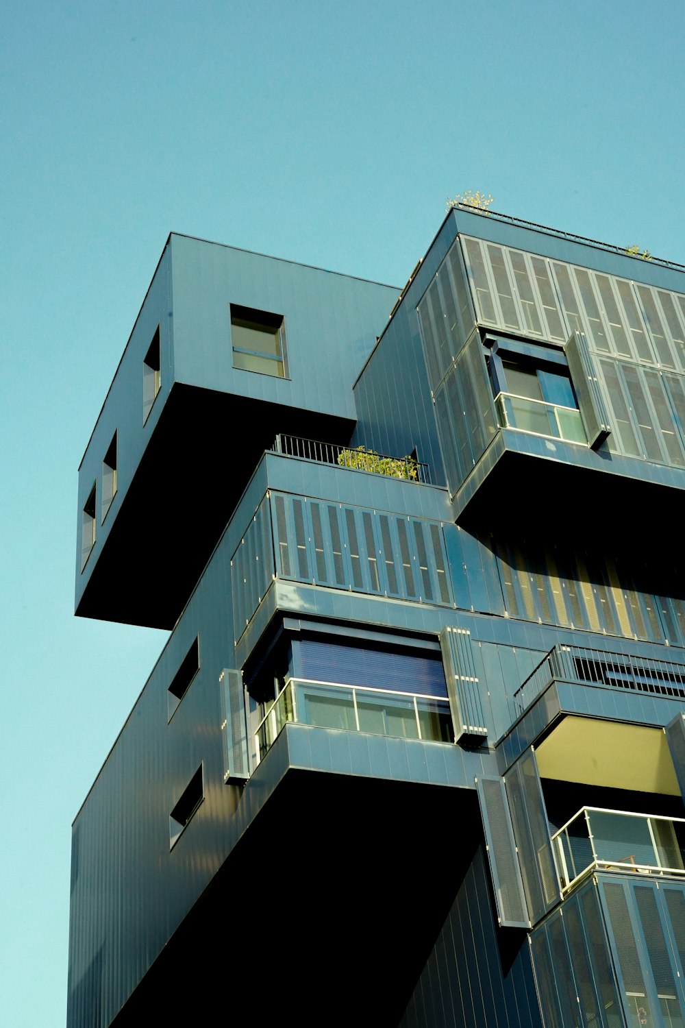 a tall building with balconies and balconies on it