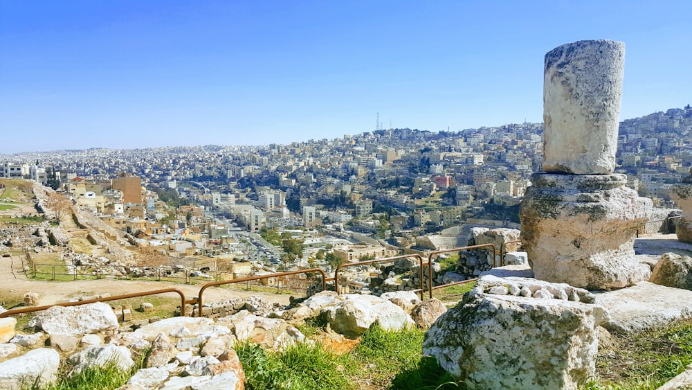 a view of a city from the top of a hill