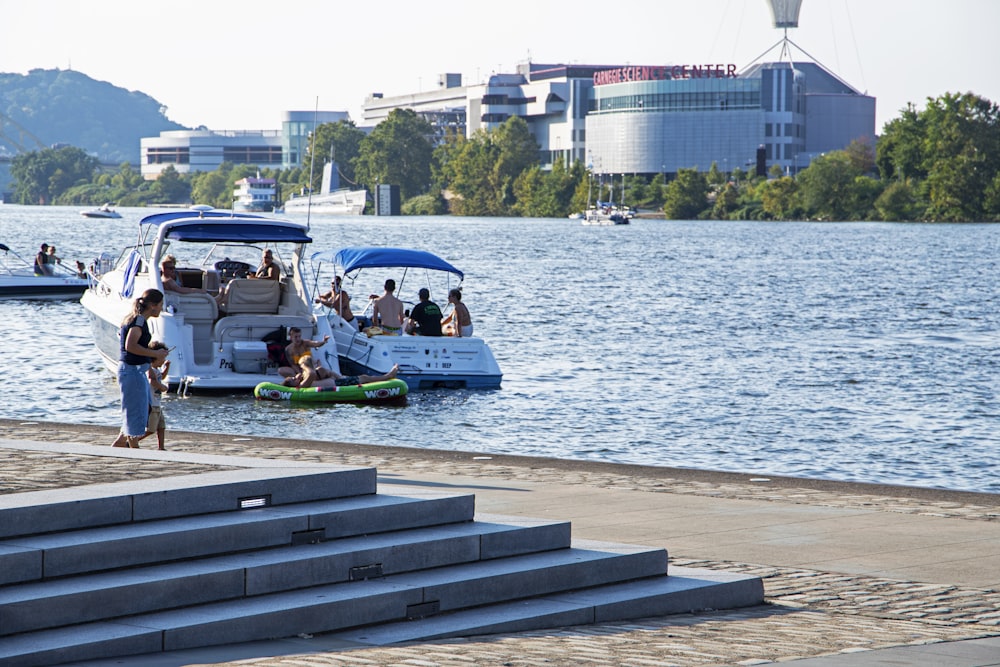 a group of people on a boat in the water