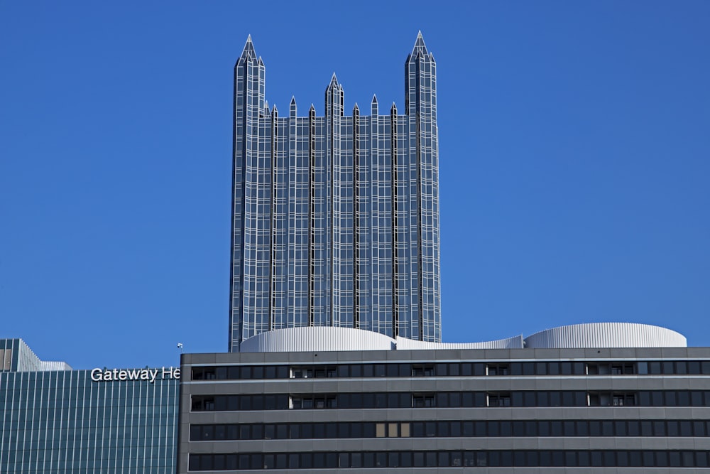 a very tall building with a clock on it's side