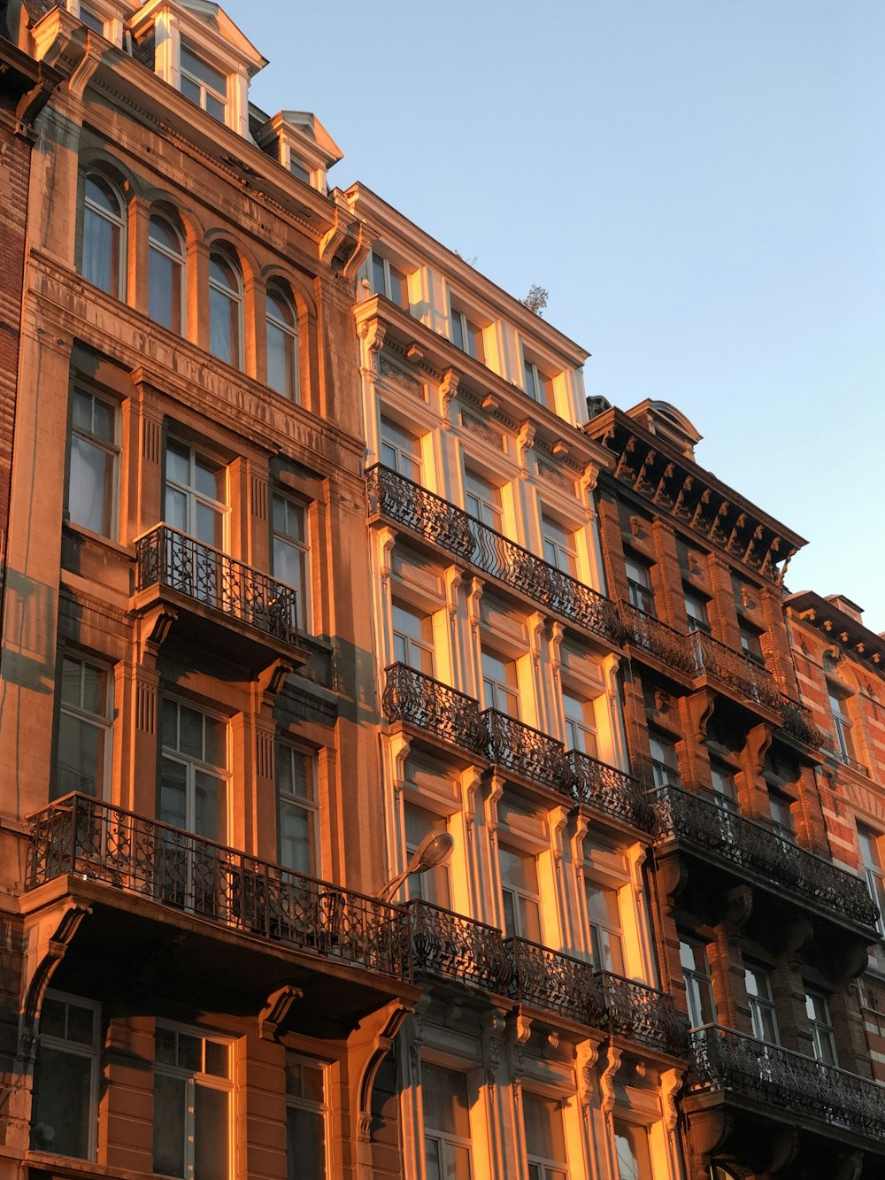 a tall building with balconies and balconies on it