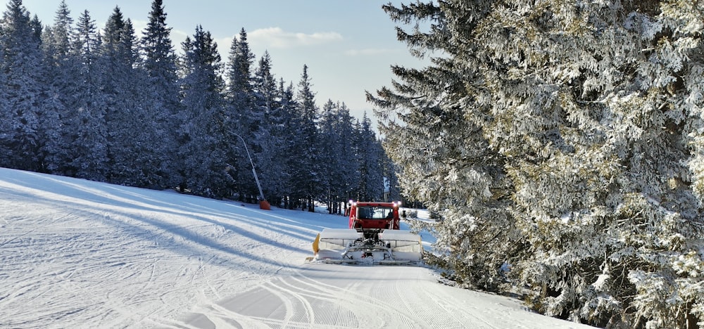 a person riding skis down a snow covered slope