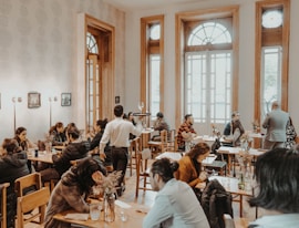 a group of people sitting at a table