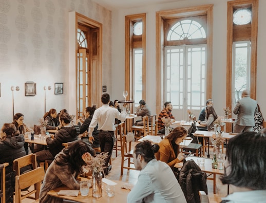 a group of people sitting at a table