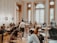 a group of people sitting at a table