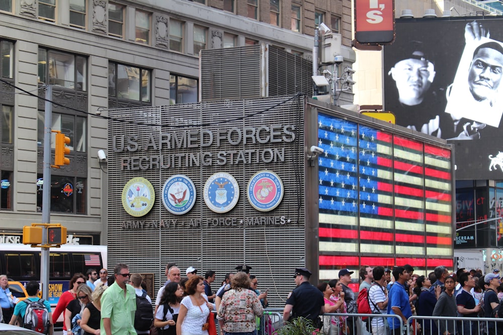 a group of people standing in front of a building